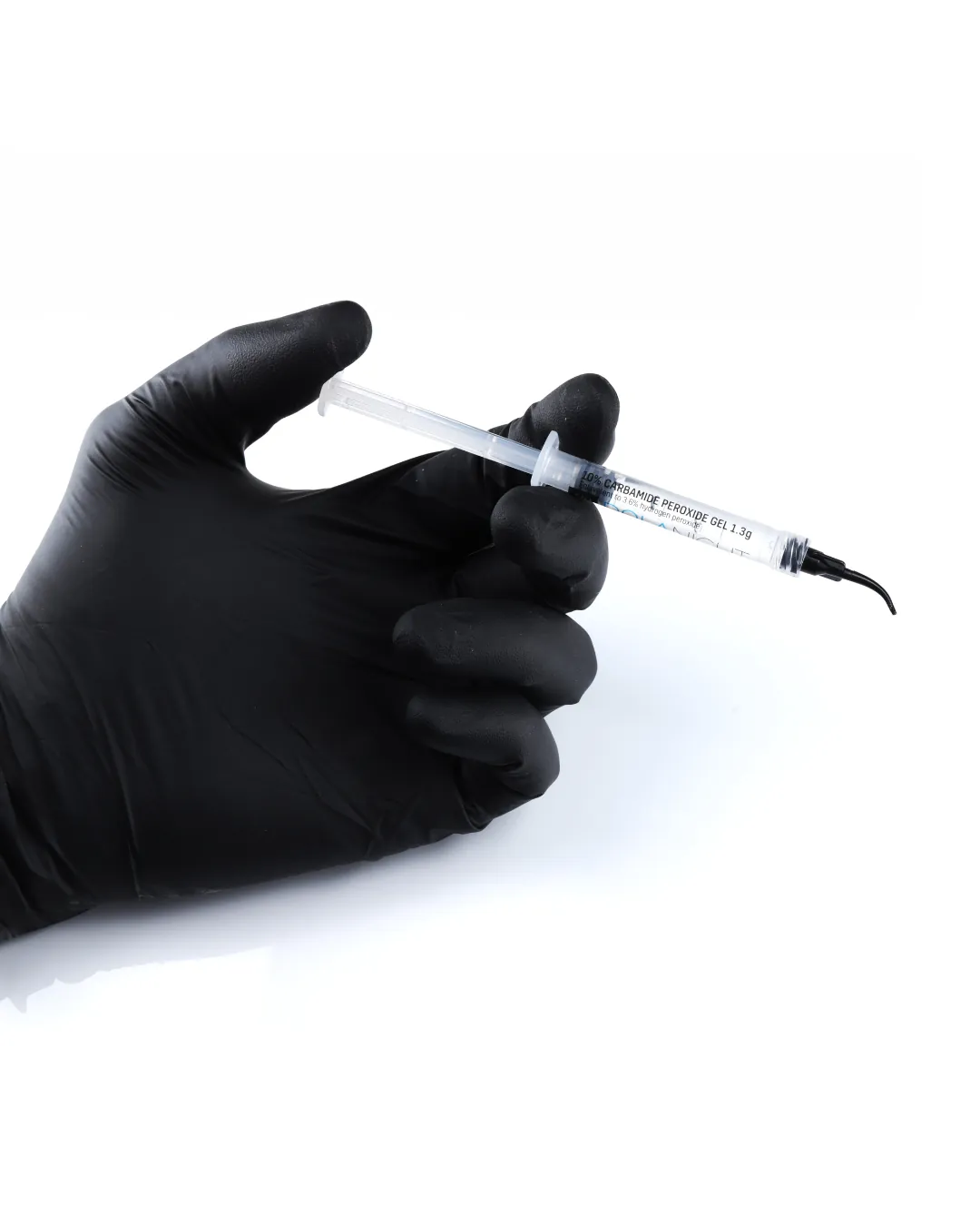 Seringue de gel d'éclaircissement dentaire ambulatoire à base de peroxyde de carbamide utilisée au cabinet du Dr Bruno Abehassera